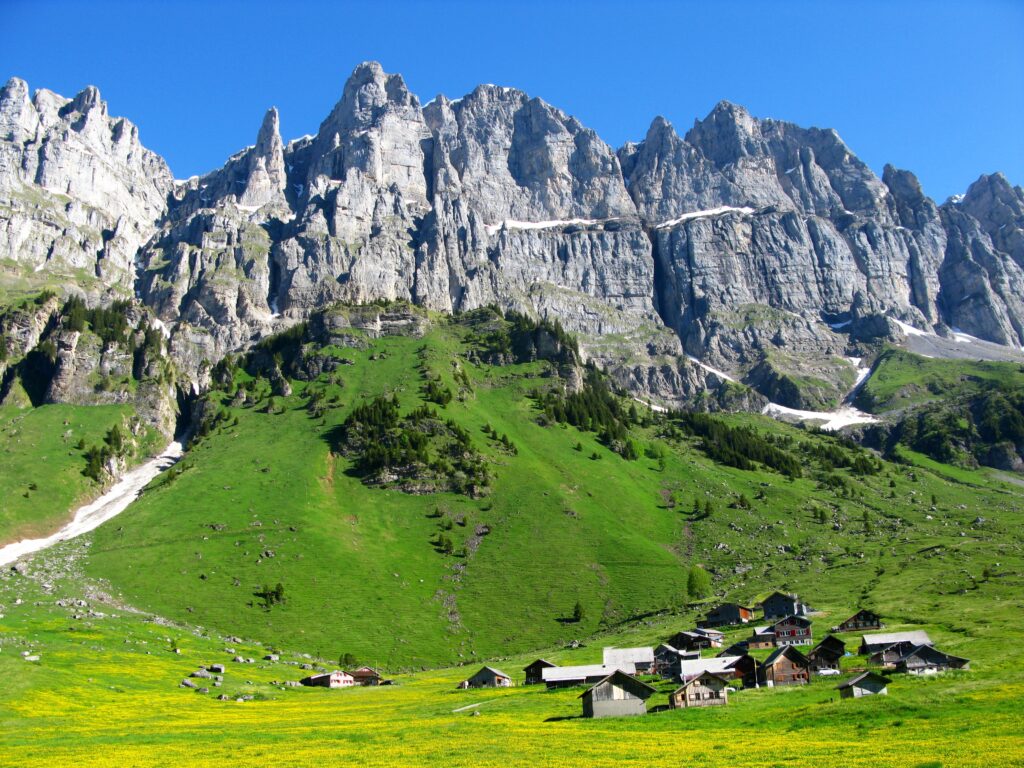 panoramic view of Swiss Alps with snow-capped peaks